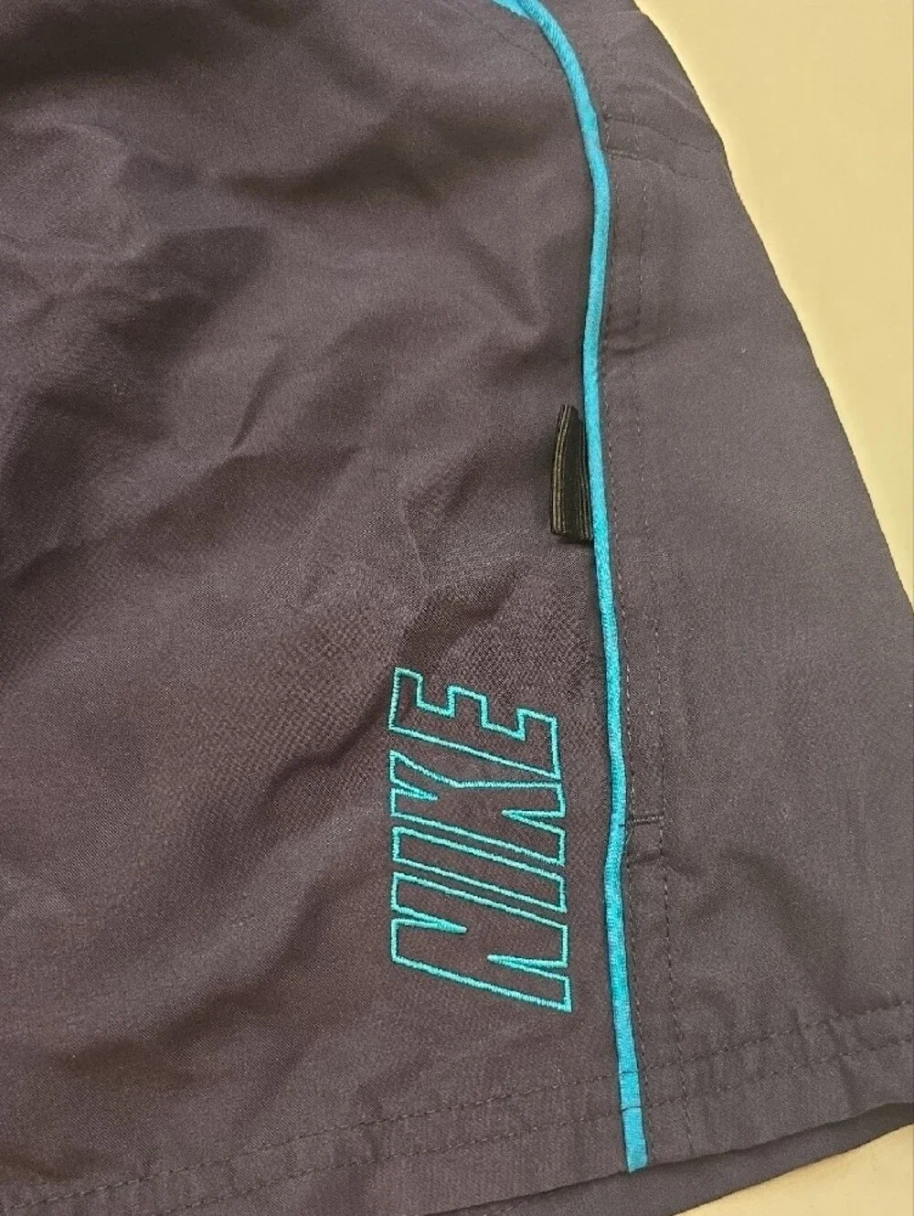 Nike Men’s Dark Blue Swim Trunks with Teal Trim